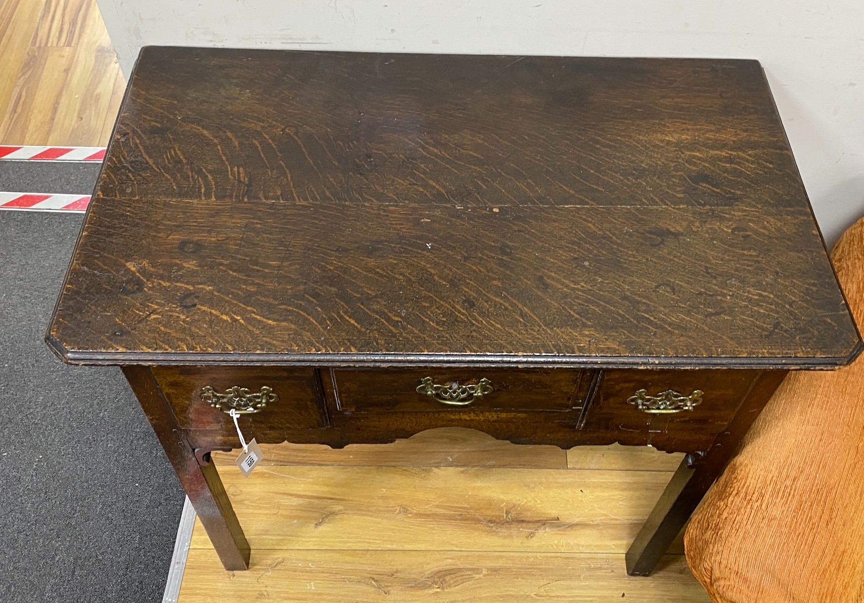 A George III oak lowboy, width 88cm, depth 51cm, height 73cm